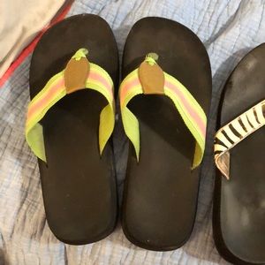 Four pairs of Yellow Box Flip Flops
